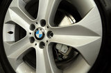 25 November 2011 - A wheel of a BMW automobile is seen in the showroom of Auto West BMW, in Richmond, B.C., Canada. Credit: Adrian Brown - N49Photo.