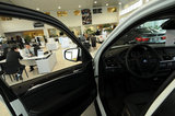 25 November 2011 - A BMW X5 is seen in the showroom of Auto West BMW, in Richmond, B.C., Canada. Credit: Adrian Brown - N49Photo.
