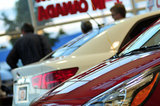 30 August 2012 - Kia vehicles are seen in the showroom at Applewood Kia, in Langley, B.C., Canada. Credit: Adrian Brown - N49Photo.