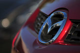 15 September 2012 - The Mazda logo is seen on a vehicle in the lot at Midway Mazda, in Surrey, B.C., Canada. Credit: Adrian Brown - N49Photo.